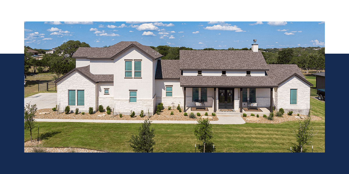 A white custom home designed and inspired by JLP Builders