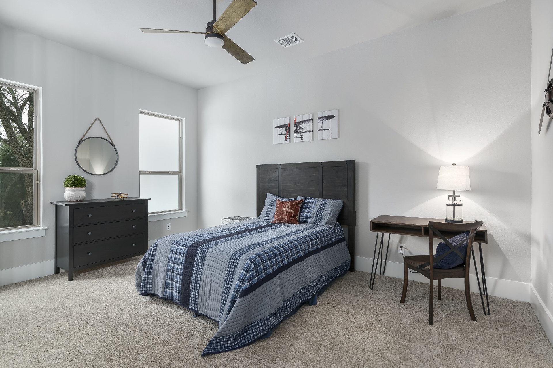 A front view of a boys bedroom within the Belle Oaks custom floor plan from JLP Builders