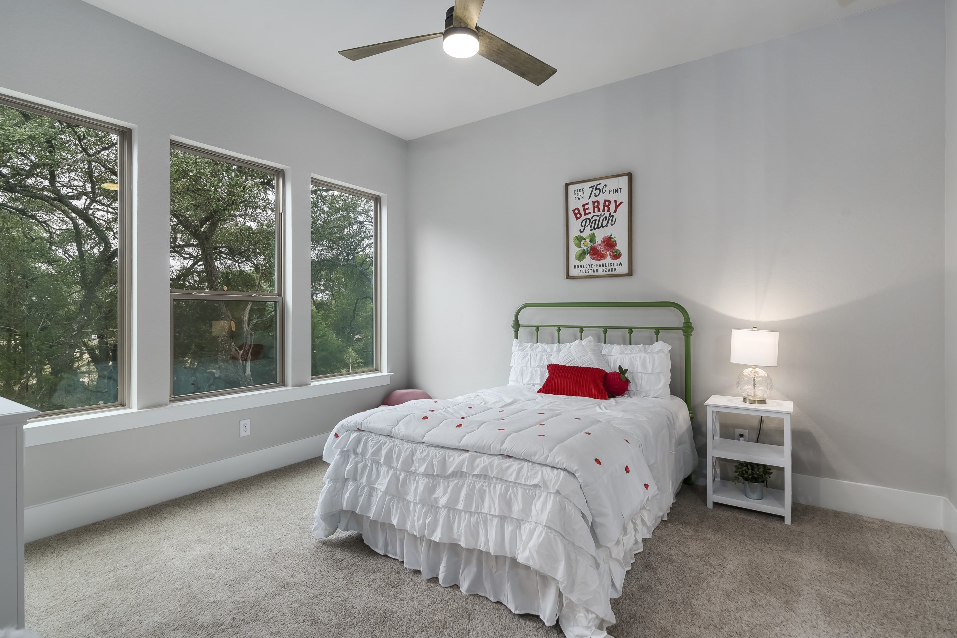 A front view of a girls bedroom within the Belle Oaks custom floor plan from JLP Builders