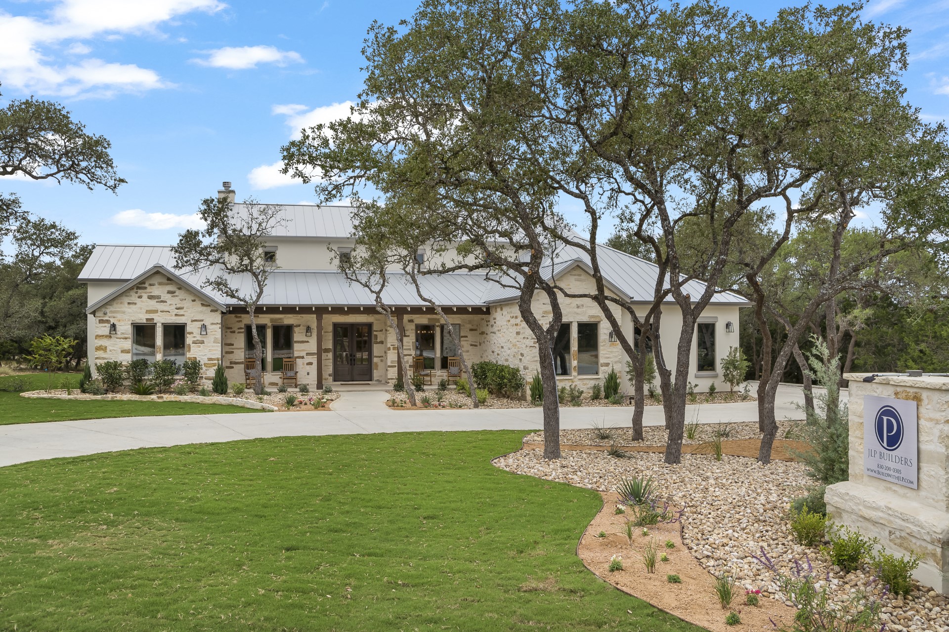 A side view of the from of the Belle Oaks custom floor plan from JLP Builders