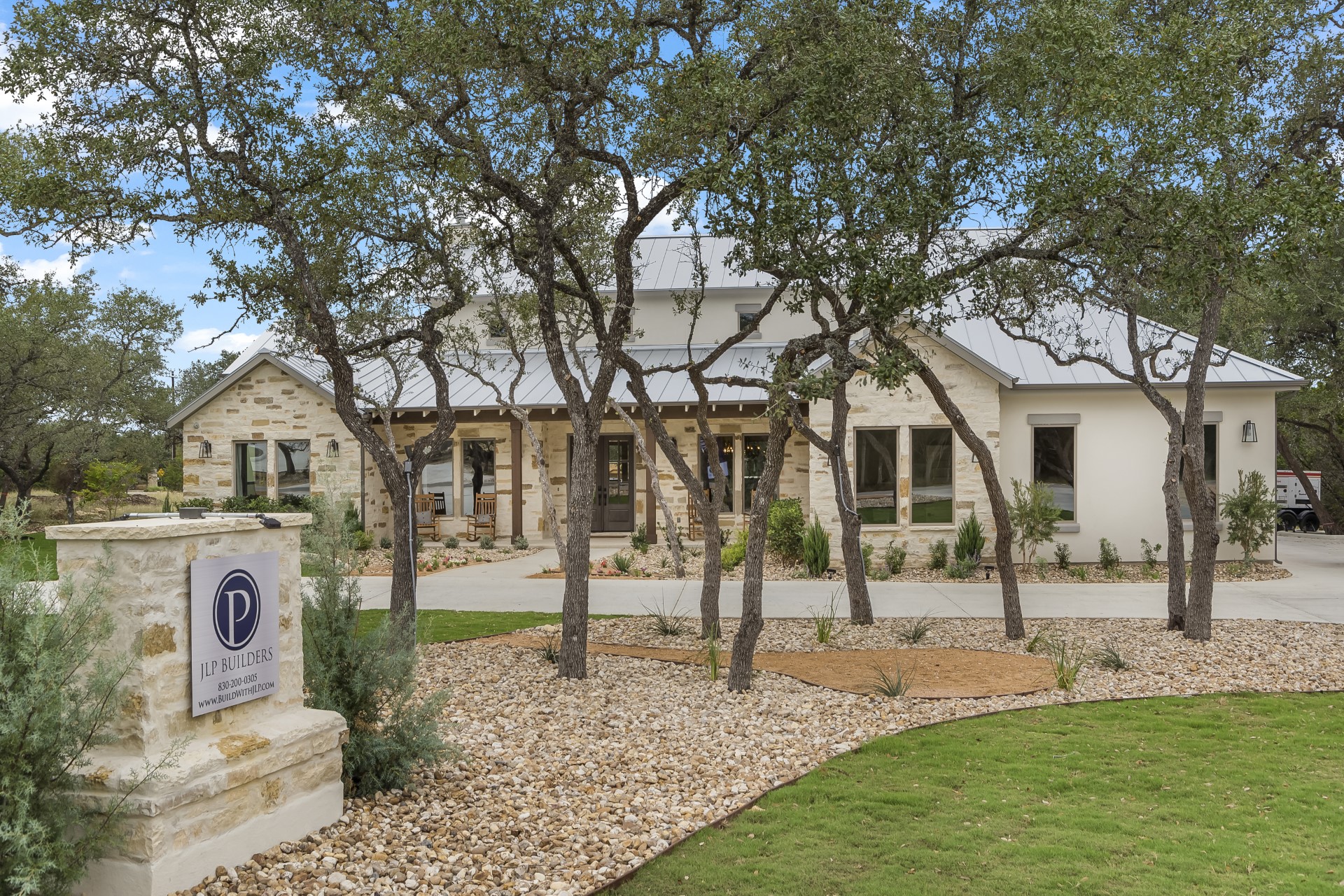 A front view of the Belle Oaks model home and custom floor plan from JLP Builders