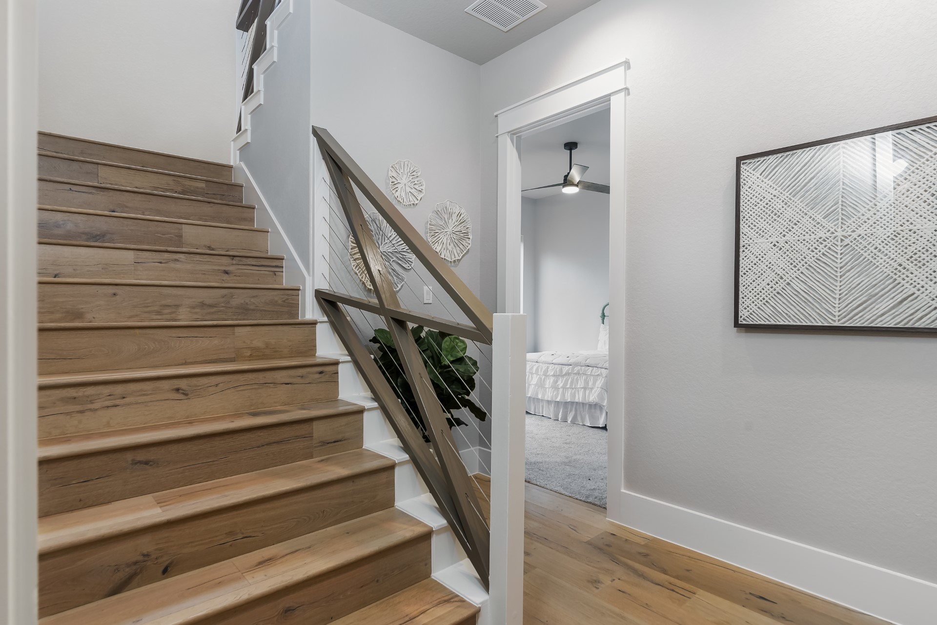 A front view of the stairs within the Belle Oaks custom floor plan from JLP Builders