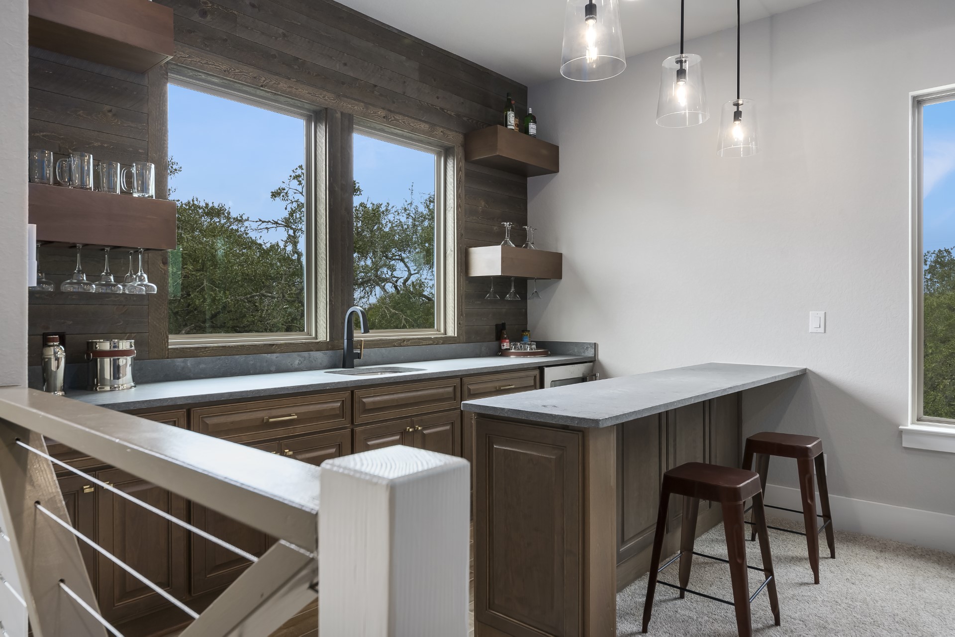 A front view of the upstairs bar area within the Belle Oaks custom floor plan from JLP Builders